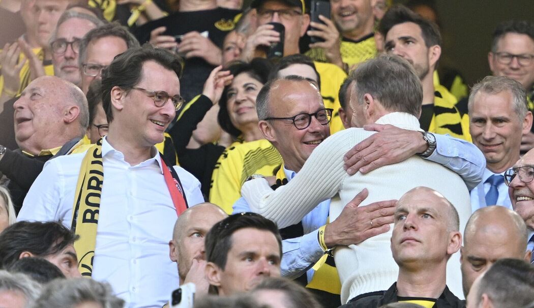 Friedrich Merz (Mitte) und Hans-Joachim Watzke