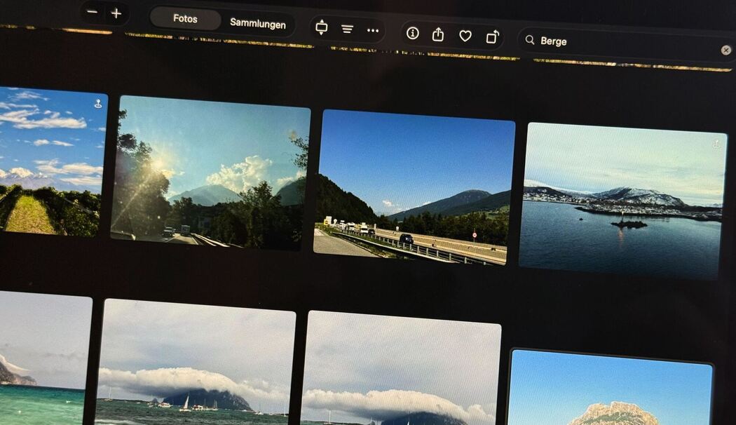 Fotos sind auf dem Display eines Mac zu sehen